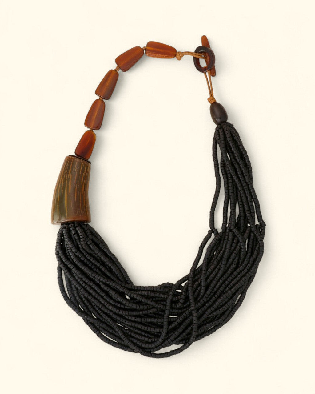 Asymmetric Horn and Coconut Bead Cascade Necklace