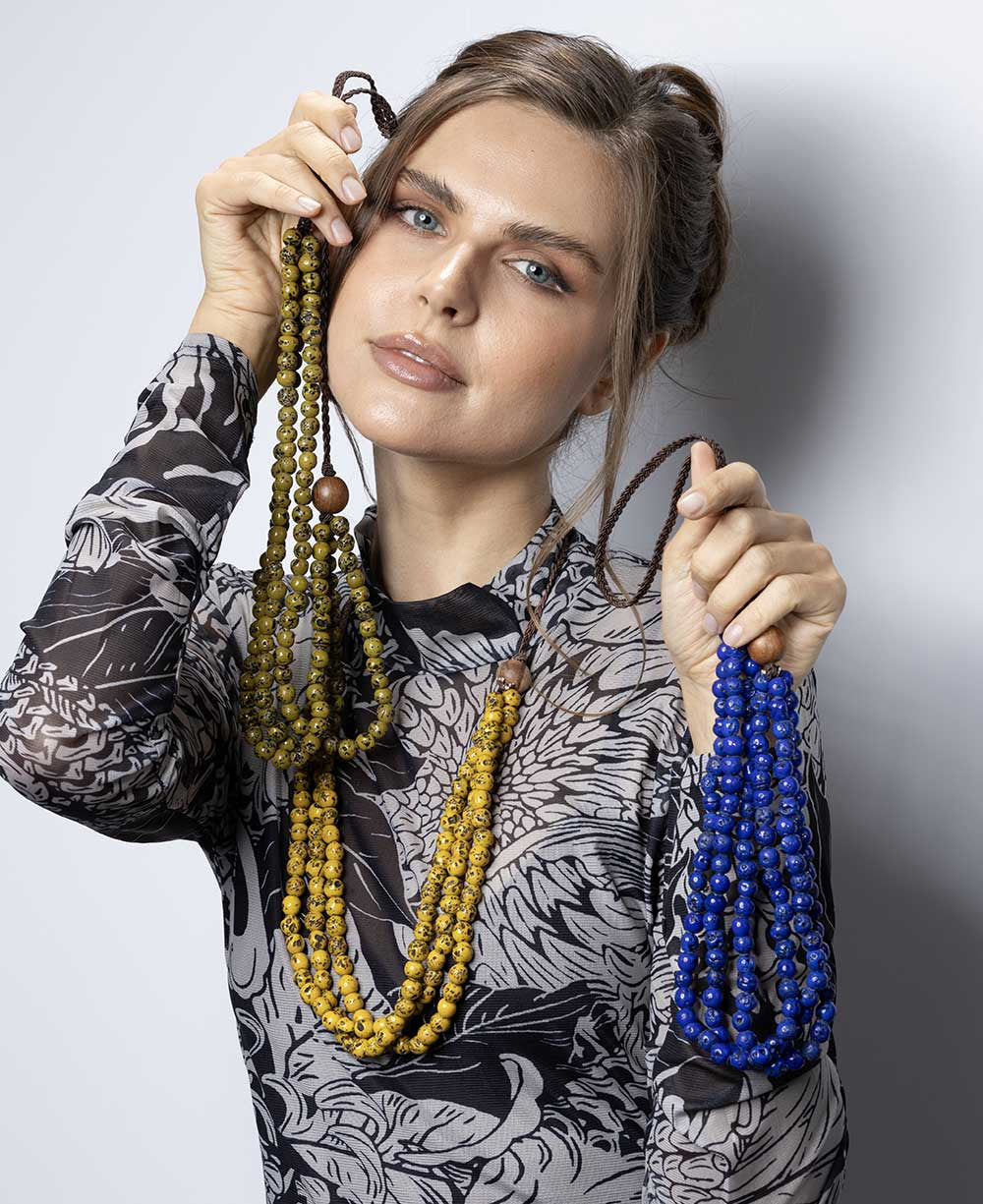Three-Strand Speckled Bead Necklace with Wood Gathers