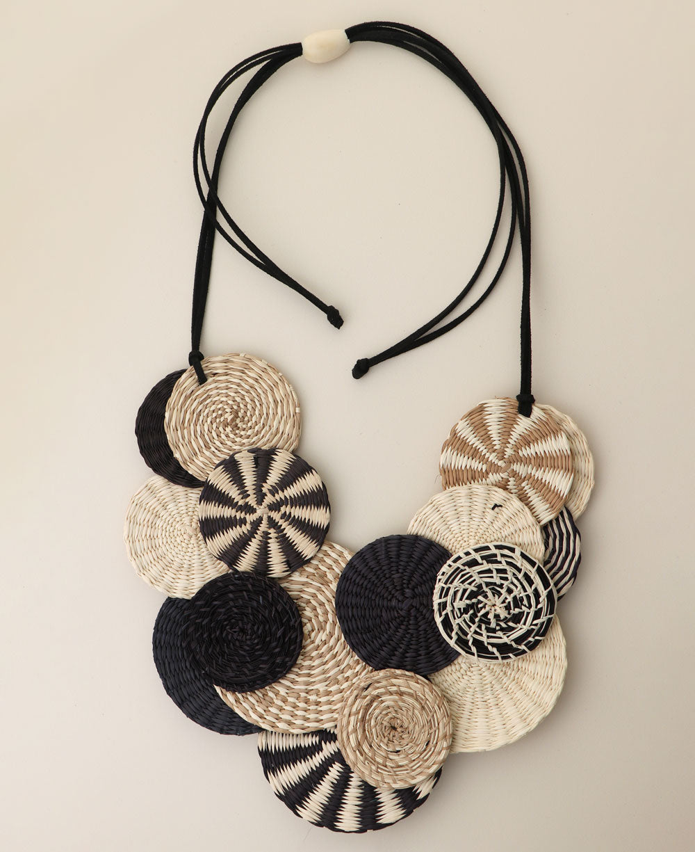 Woven Disk Bib Necklace in Black and Cream