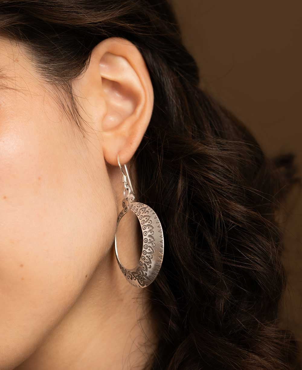 Silver Crescent Hoop Earrings with Stamped Floral Border