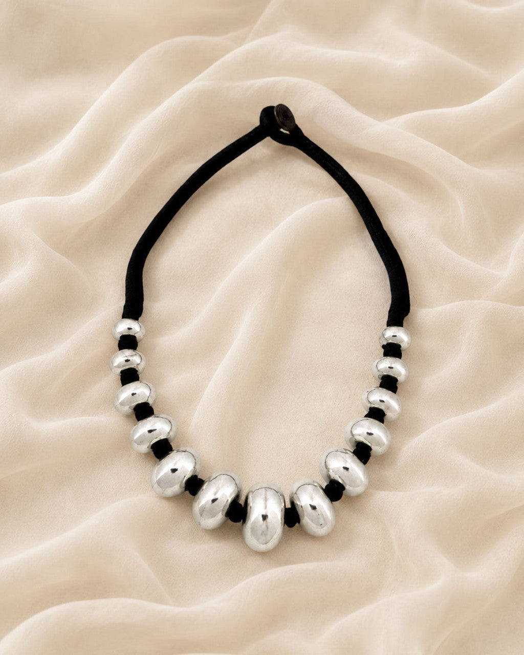 Graduated Silver Rondelle Necklace on Cord