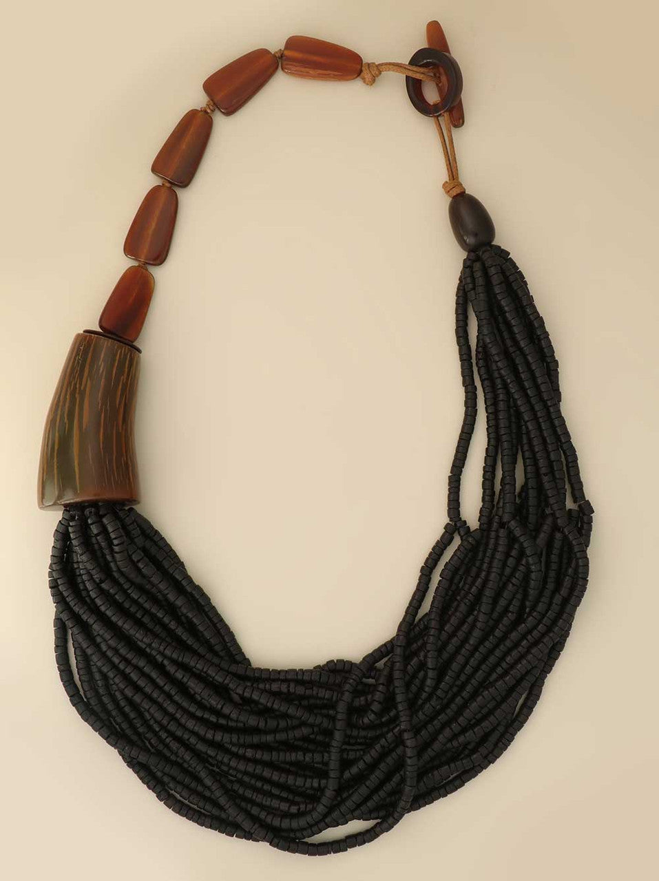 Asymmetric Horn and Coconut Bead Cascade Necklace