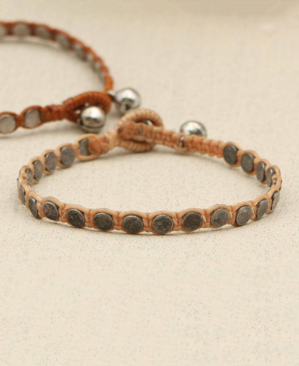 Woven Disk Bracelet with Bell