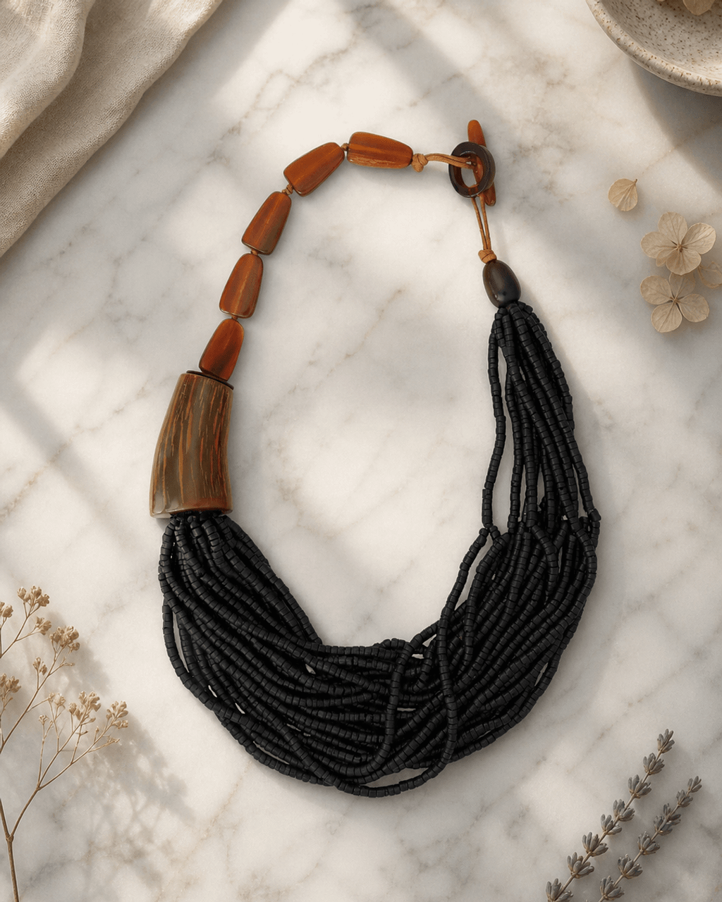 Asymmetric Horn and Coconut Bead Cascade Necklace