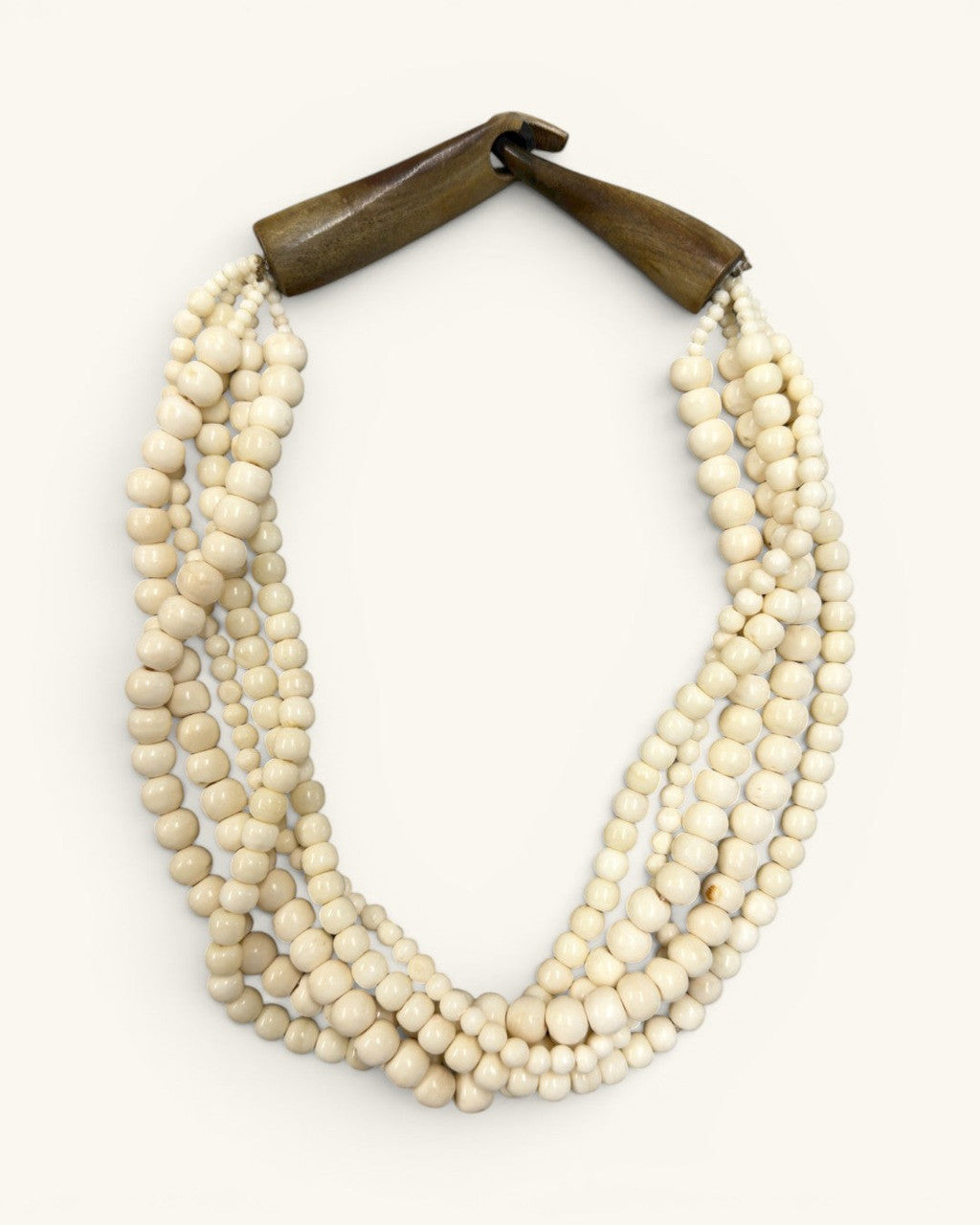 Five-Strand Cream Bone Necklace, Carved Horn Terminals