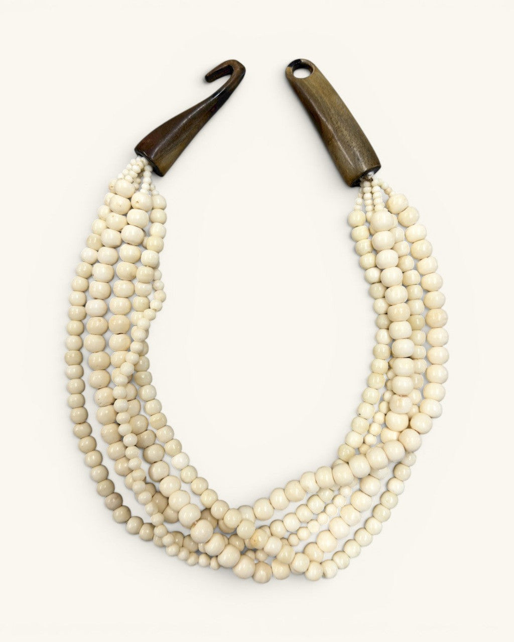 Five-Strand Cream Bone Necklace, Carved Horn Terminals