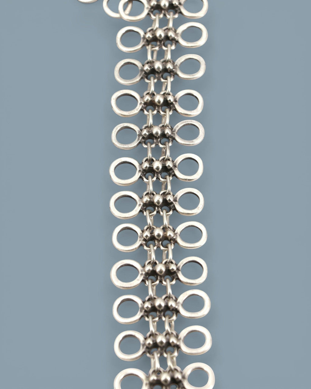 Cutout Disc Lariat Necklace with Woven Silver Drop