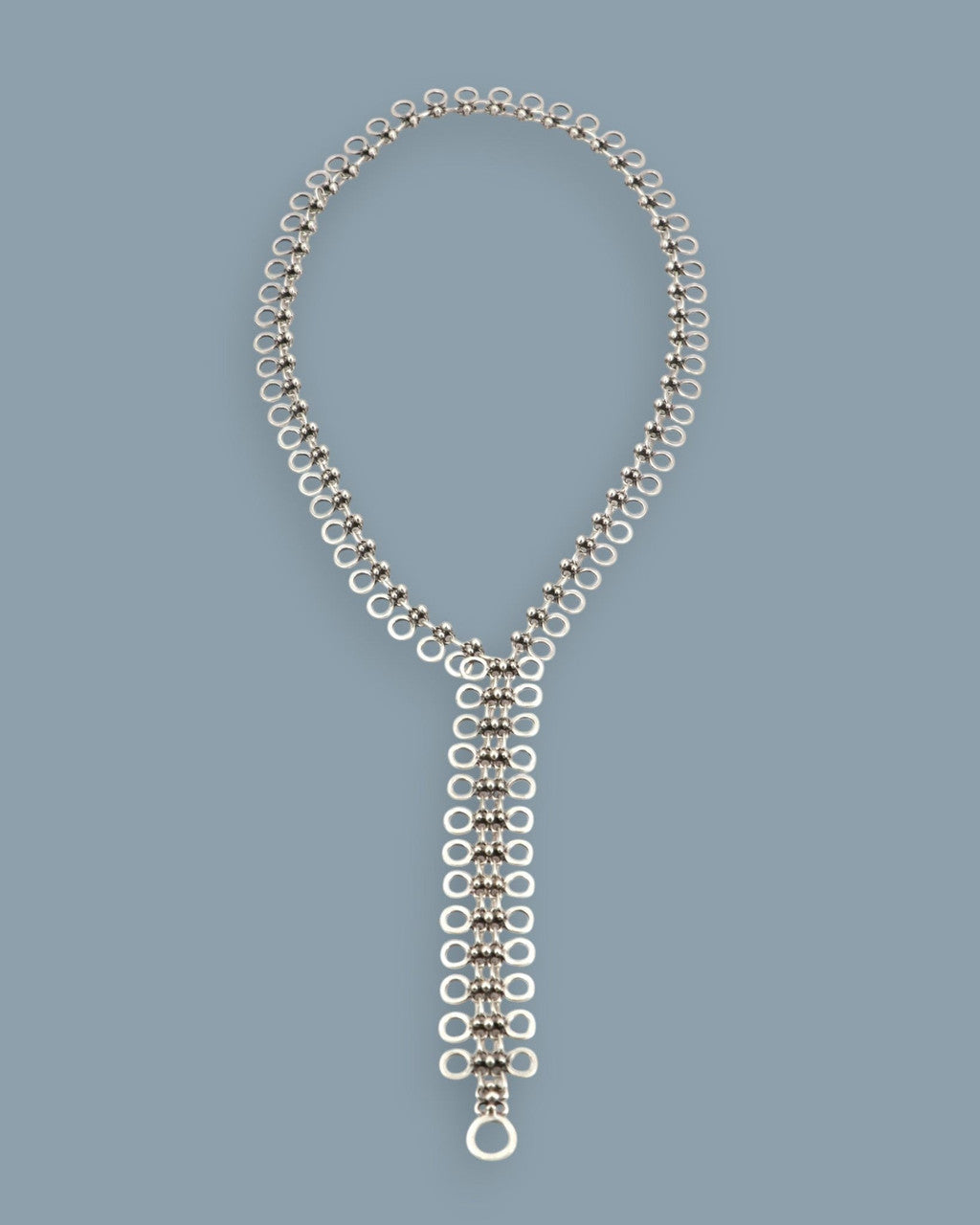 Cutout Disc Lariat Necklace with Woven Silver Drop