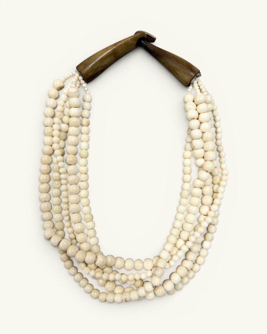 Five-Strand Cream Bone Necklace, Carved Horn Terminals