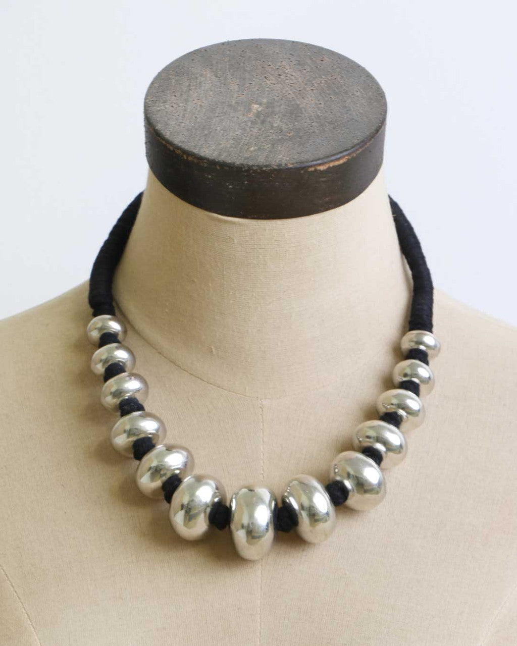 Graduated Silver Rondelle Necklace on Cord
