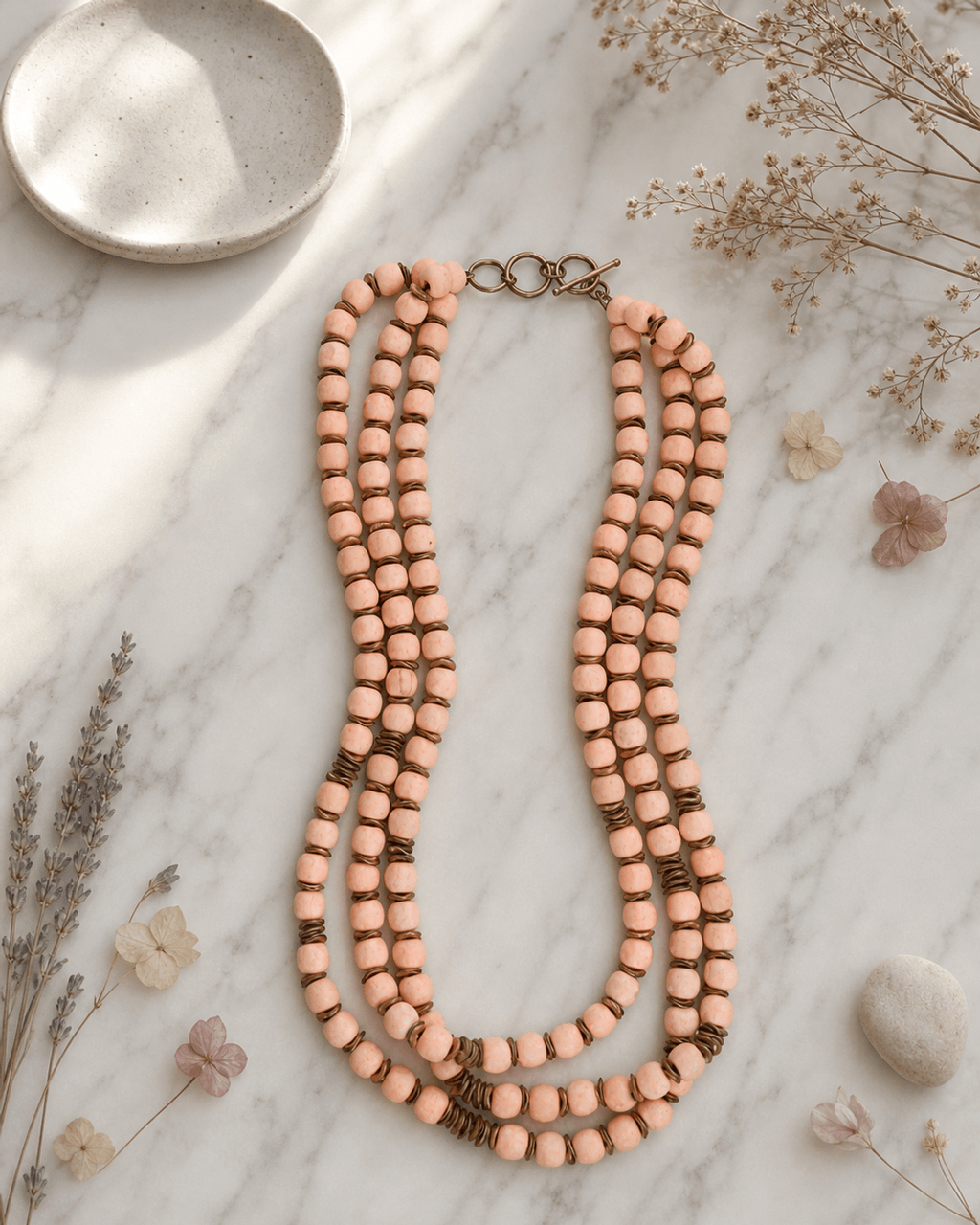 Three-Strand Peach Wood Bead Necklace with Wavy Brass Spacers